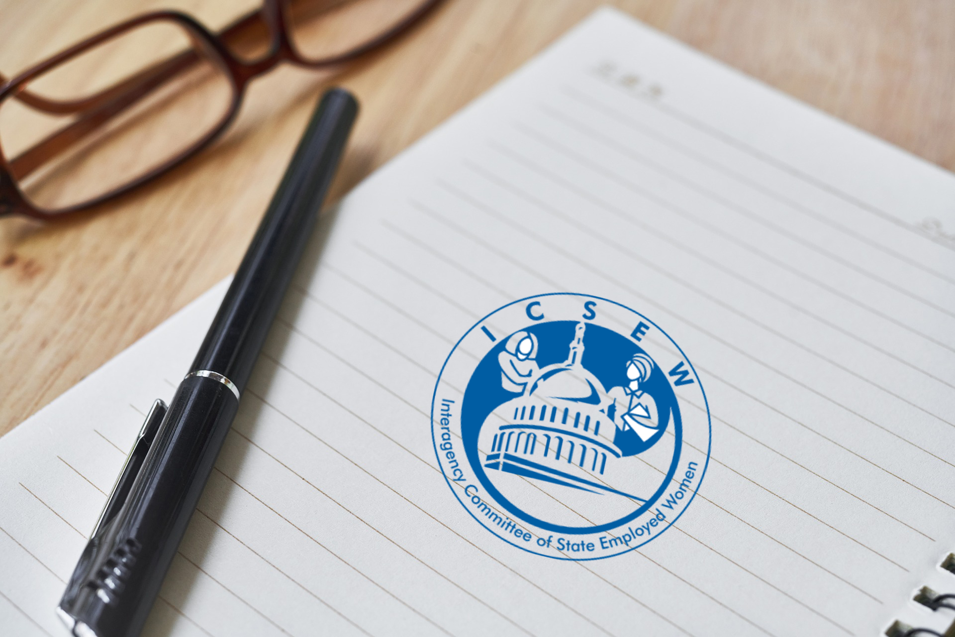 notebook with ICSEW logo
